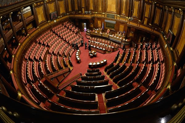 This picture shows an empty senate prior a session for a confidence vote for the new governement on April 30, 2013 in Rome. Italy's new prime minister will face an early test of his mission to reverse Europe's austerity course Tuesday as he meets German Chancellor Angela Merkel after vowing to stop a policy he says is killing his country.  AFP PHOTO / ANDREAS SOLARO        (Photo credit should read ANDREAS SOLARO/AFP/Getty Images)
